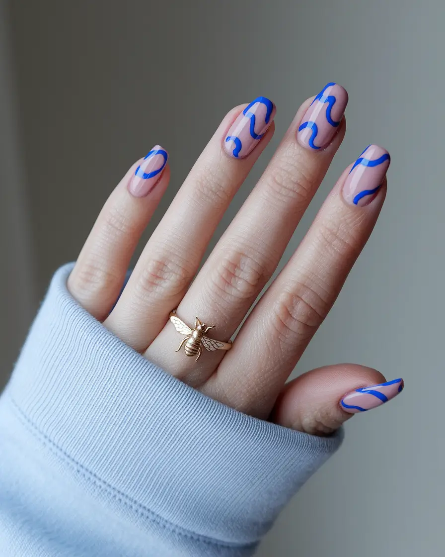 basic summer nails ideas Freeform Blue Waves for a Modern Minimalist Look