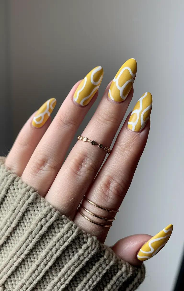 cute summer nails ideas 2025 Modern Yellow Swirls