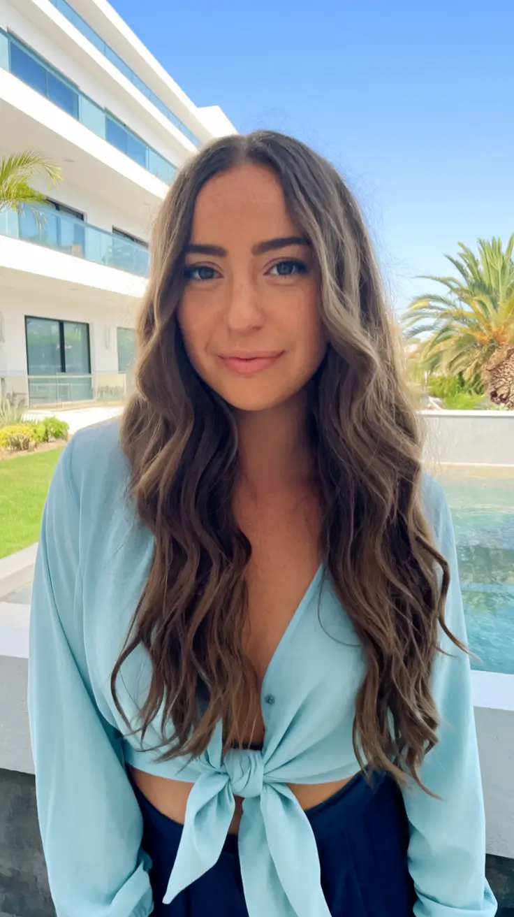 easy summer hairstyles Loose Wavy Layers with Center Part