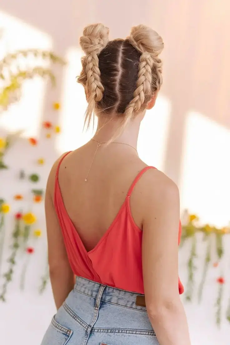 july hairstyles ideas 2025 Modern Double Buns with Braided Spice