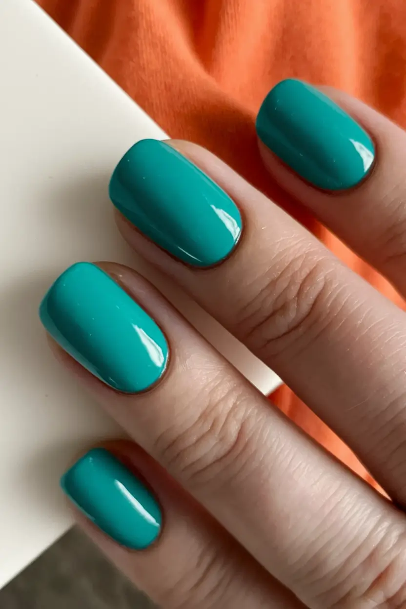 july nails colors 2025 Teal Blue Pop of Color