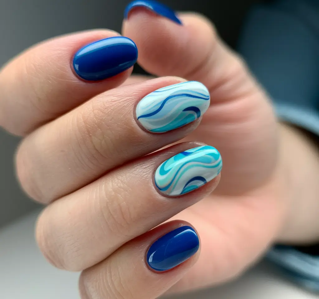 simple summer nails ideas 2025 Abstract Sea Swirls with Summer Energy