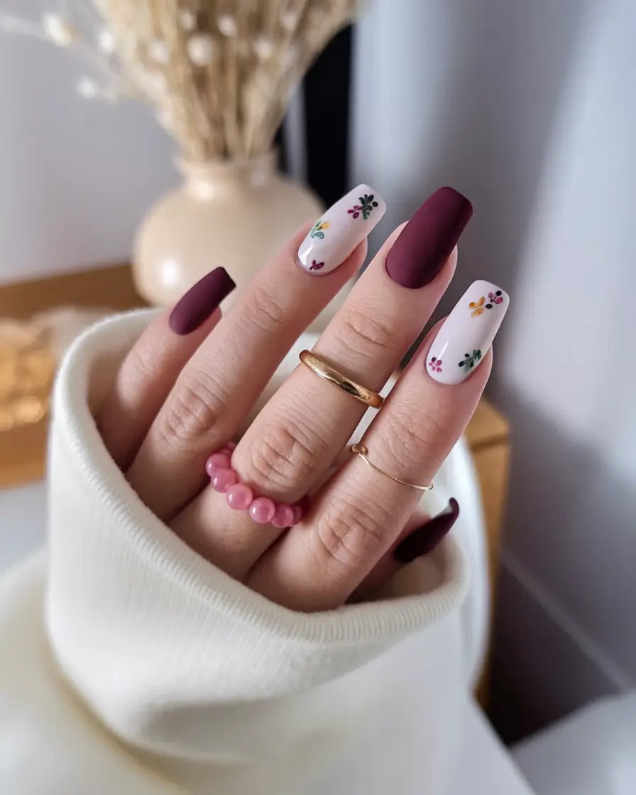 end of summer nails ideas 2025 Burgundy & Baby Florals with Cozy Vibes