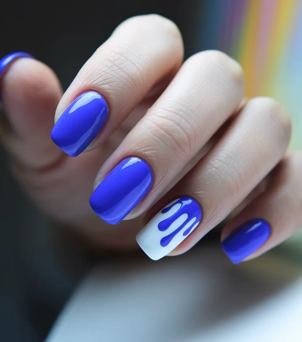 july nails ideas 2025 Electric Blue Meets Abstract Drip