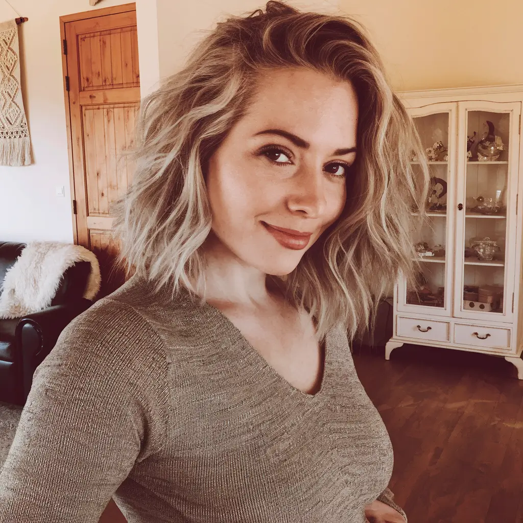 fall hairstyle short hair Polished Sleek Bob with Subtle Asymmetry