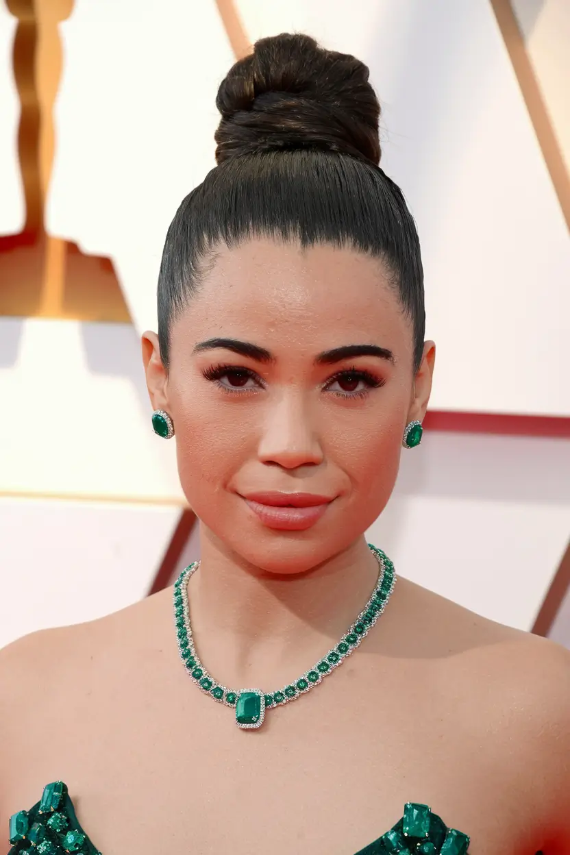 oval face haircuts Sleek High Bun for Statement Days
