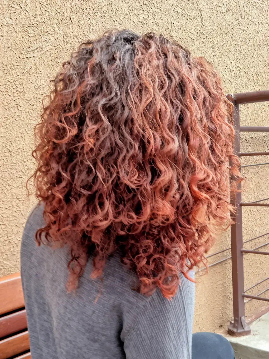 fall red hair color Ginger Curls with Sun-Drenched Depth