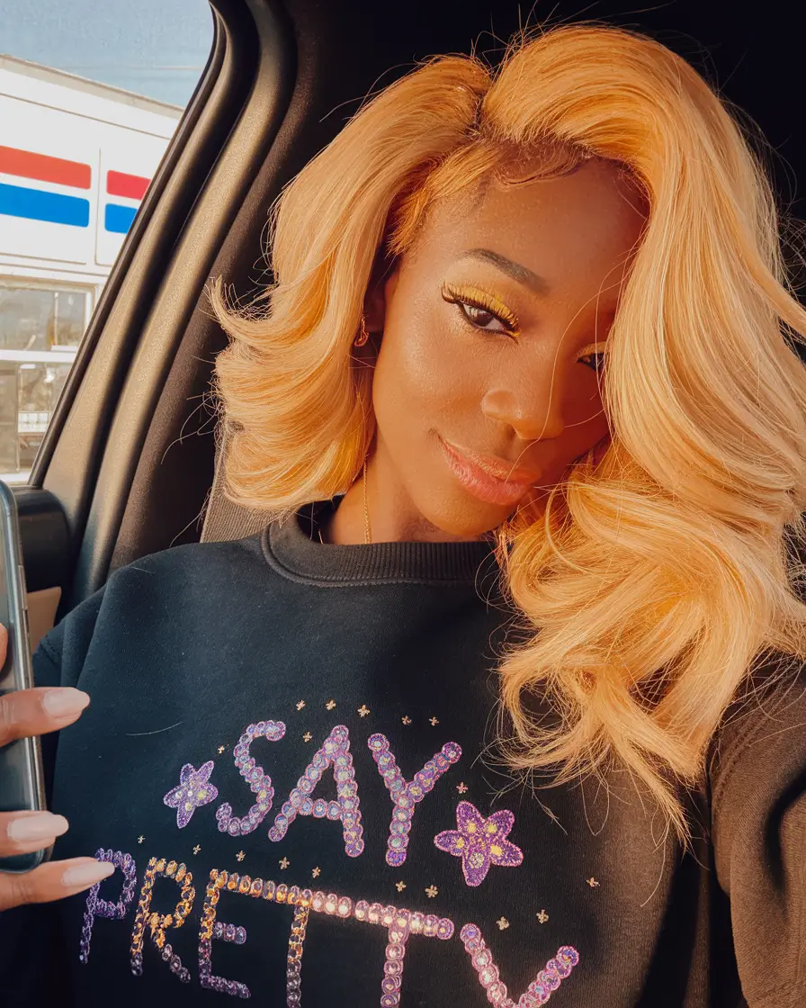 fall blonde hair color black women Peachy Golden Luxe Curls