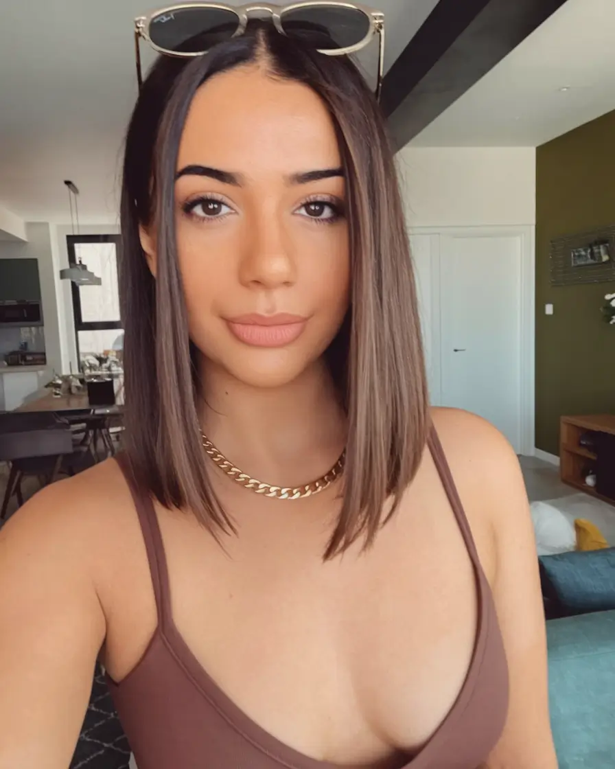 fall bob hairstyles 2025 Glossy Brunette with Angled Ends
