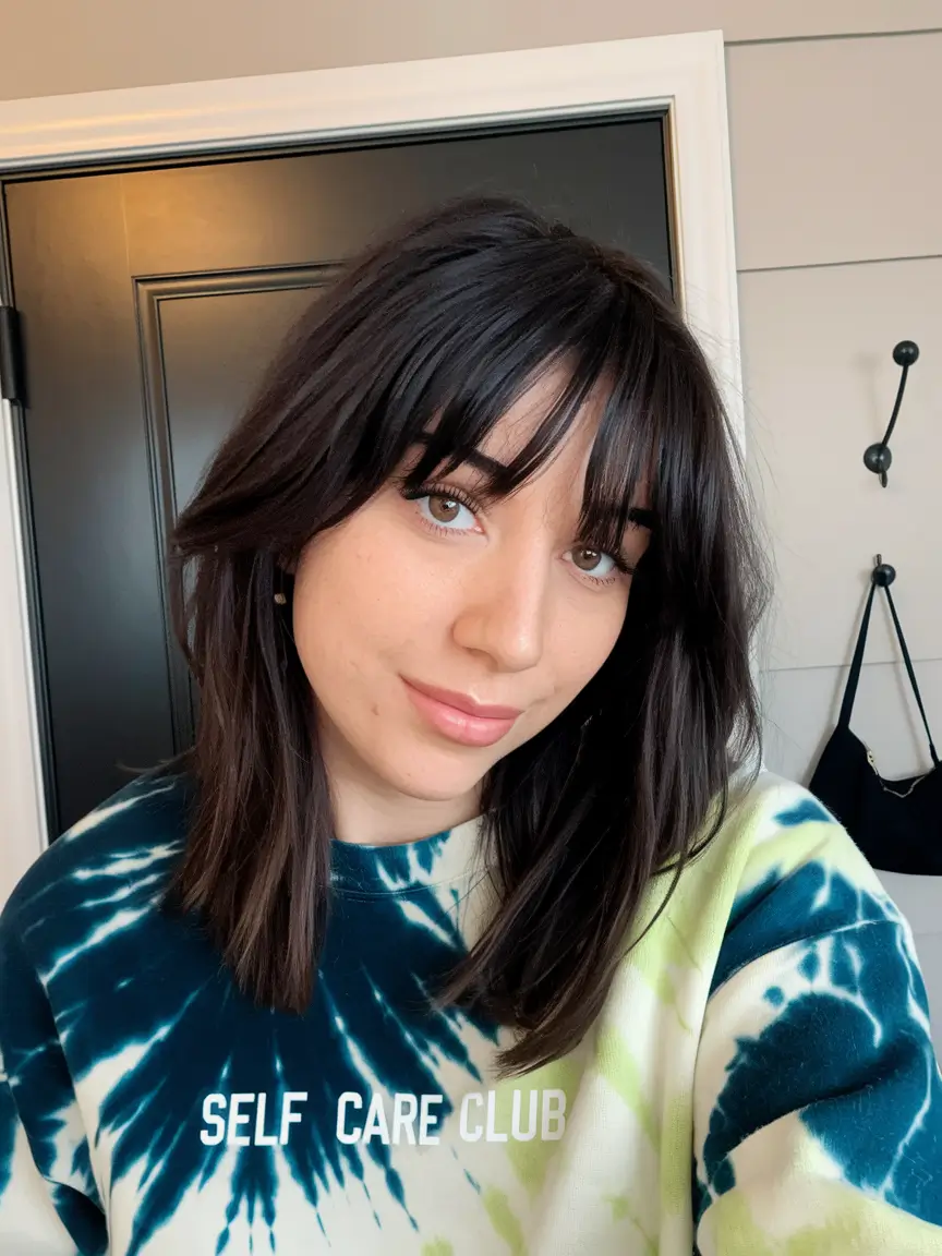medium haircuts for chubby faces Mid-Length Cut with Wispy Fringe and Soft Layers